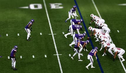 Arizona Cardinals quarterback Kyler Murray scans the Minnesota Vikings defense during a Week 13 matchup.