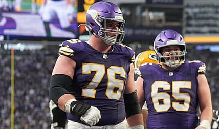 Minnesota Vikings offensive guard Will Fries celebrates in the end zone during a game against the Green Bay Packers at U.S. Bank Stadium.