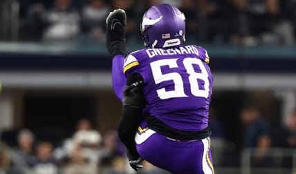 Jonathan Greenard celebrates with Vikings linebackers Eric Wilson and Andrew van Ginkel after a defensive play against the Dallas Cowboys.