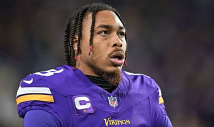 Justin Jefferson warms up before facing the Packers at U.S. Bank Stadium.