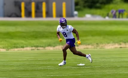Jakobe Thomas runs through Vikings minicamp practice in Eagan.