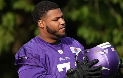Christian Darrisaw practices with the Vikings in the United Kingdom in 2024.