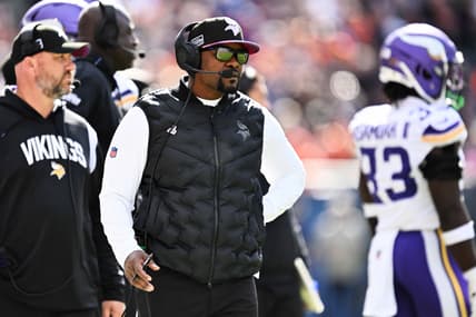 Minnesota Vikings defensive coordinator Brian Flores watches from the sideline during a game against the Chicago Bears at Soldier Field.
