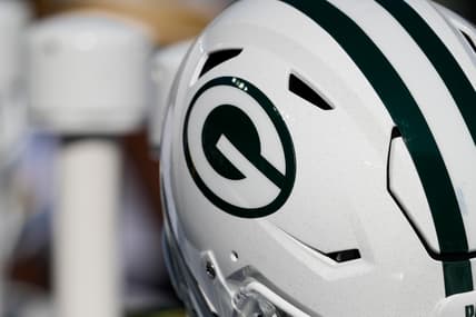Green Bay Packers helmets on the sideline during the game against the Texans.