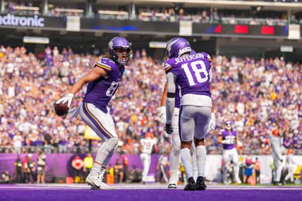 T.J. Hockenson celebrates a touchdown with Justin Jefferson during a Vikings game against the Bengals.