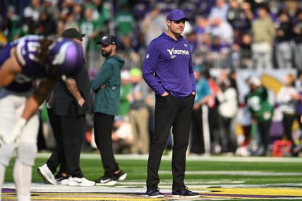 Kevin O’Connell watching pregame warmups on the sideline before a Vikings game against the Eagles