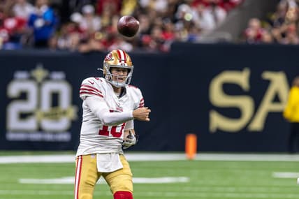San Francisco 49ers quarterback Mac Jones throws a pass against the New Orleans Saints during an NFL game at Caesars Superdome.