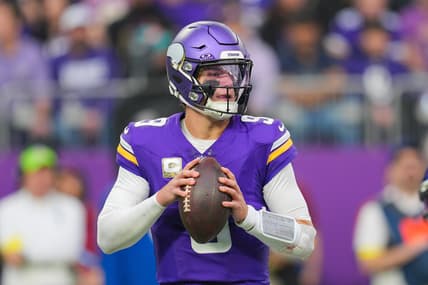 Vikings quarterback J.J. McCarthy drops back to pass against the Ravens at U.S. Bank Stadium.
