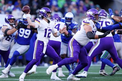 Vikings quarterback Max Brosmer drops back to pass against the Seattle Seahawks at Lumen Field.