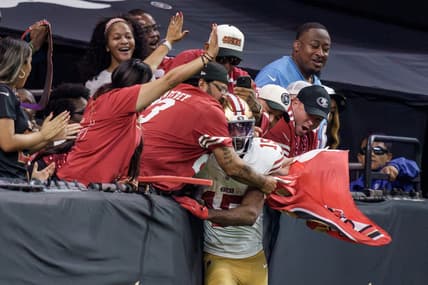 49ers wide receiver Jauan Jennings celebrates a touchdown with fans at Caesars Superdome in New Orleans.