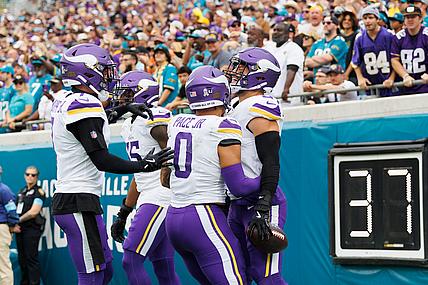 Vikings defenders celebrate a fumble recovery during the game against the Jaguars at EverBank Stadium.