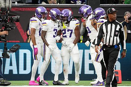 Jordan Addison celebrates a touchdown with teammates during the Vikings’ International Series game against the Browns in London.