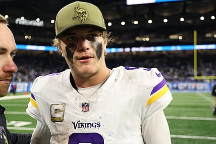 J.J. McCarthy walking off field after Vikings game at Ford Field