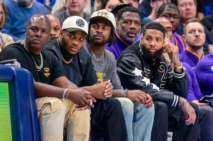 Trevon Diggs, Micah Parsons, and Odell Beckham at an NBA game in 2022