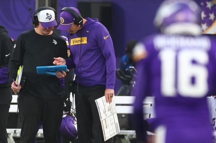 Kevin O’Connell reviews plays during the fourth quarter of the Vikings’ game against the Jets in London.