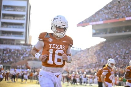 Arch Manning takes the field for Texas before the CFP playoff game vs. Clemson in 2024.