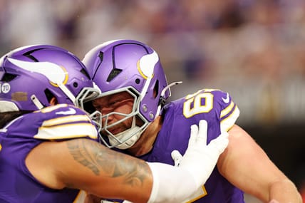 Minnesota Vikings guard Michael Jurgens joins teammates in a pregame huddle before a game against the Atlanta Falcons at U.S. Bank Stadium.