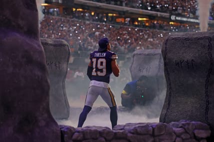 Adam Thielen enters the field before the Vikings’ game against the Falcons at U.S. Bank Stadium.