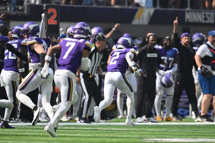 Minnesota Vikings cornerback Isaiah Rodgers runs with the ball after intercepting a pass and scoring a touchdown against the Cincinnati Bengals at U.S. Bank Stadium..