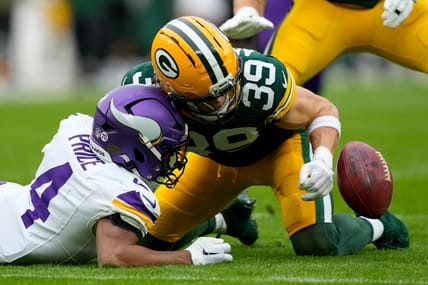 Vikings WR Myles Price fumbles at Lambeau Field.