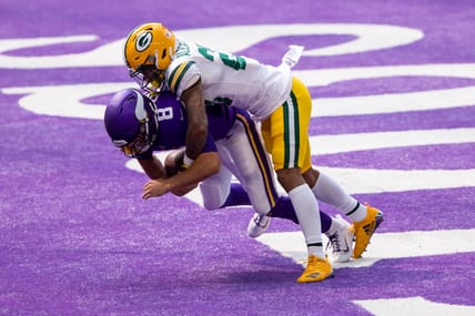 Jaire Alexander sacks Kirk Cousins in the end zone for a safety at U.S. Bank Stadium