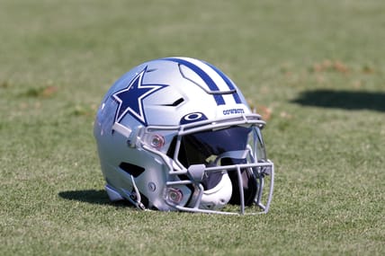 A Dallas Cowboys helmet on the field in 2022