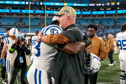 Colts DT Eric Jkhnson hug Frank Reich
