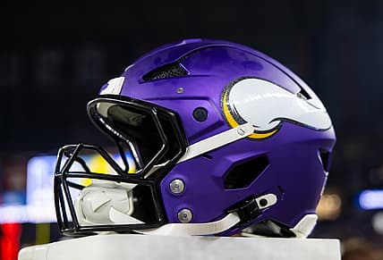 Minnesota Vikings helmet sits on the sideline before a playoff game against the Rams.