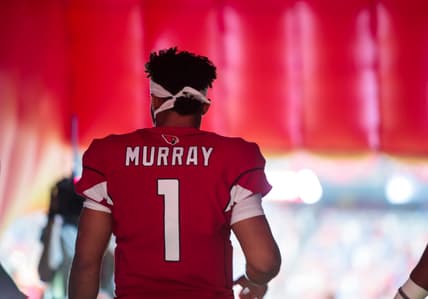 Kyler Murray preparing for a play against the Lions at State Farm Stadium