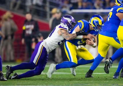 Blake Cashman tackles Matthew Stafford during the Vikings’ NFC Wild Card game against the Rams in Glendale.