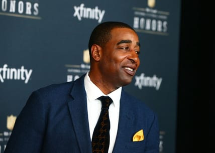 Cris Carter walks the red carpet at the NFL Honors ceremony in Phoenix.
