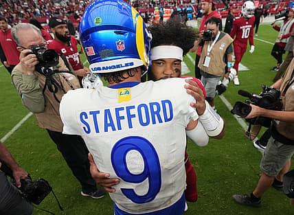 Rams QB Matthew Stafford and Cardinals QB Kyler Murray embrace after a game