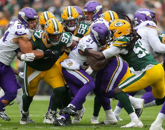 Cam Akers tackled by multiple Packers defenders during Vikings game