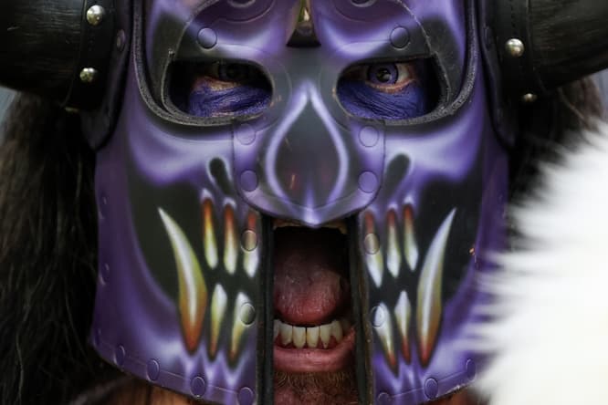 A Vikings fan looks on from the stands before the team’s home game against the Colts.