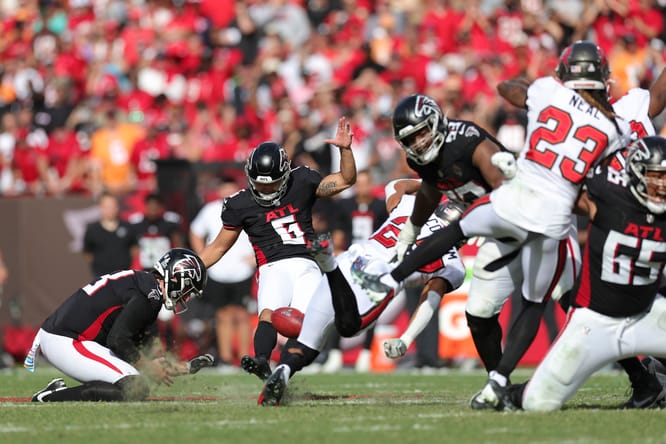 Younghoe Koo kicks a game-winning field goal against the Buccaneers in Tampa.