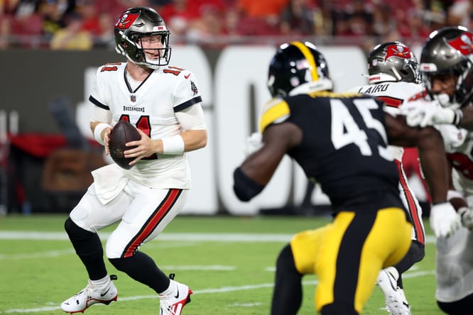 John Wolford drops back to pass during second-half action of the Buccaneers’ preseason game against the Steelers in Tampa.