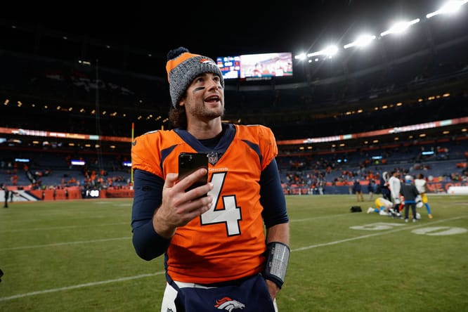 Jarrett Stidham after a game at Empower Field at Mile High.