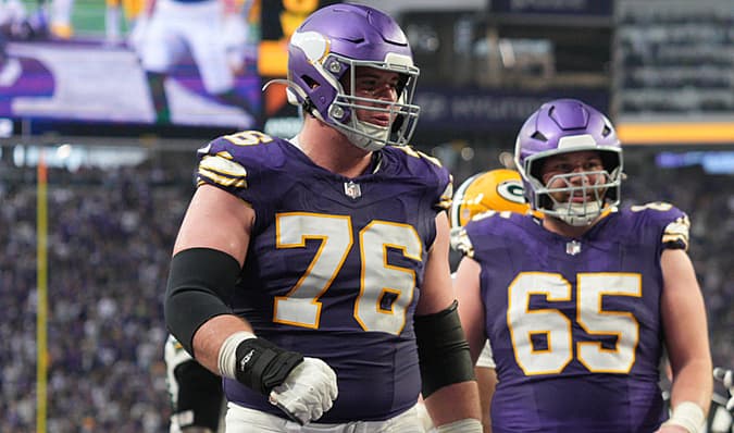 Minnesota Vikings offensive guard Will Fries celebrates in the end zone during a game against the Green Bay Packers at U.S. Bank Stadium.