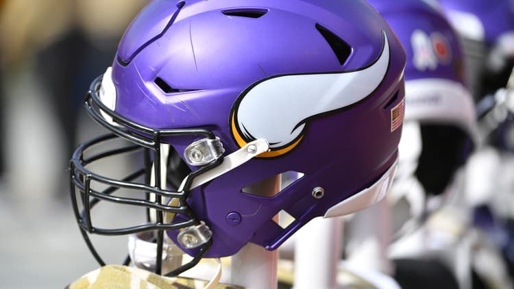 Minnesota Vikings helmet sits on the sideline during a game against the Kansas City Chiefs.