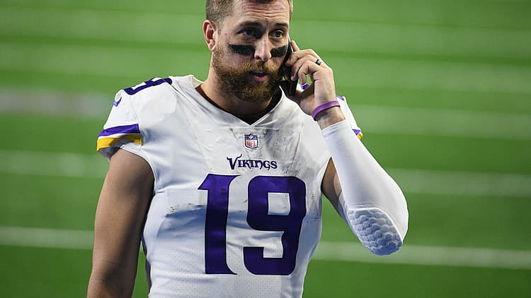 Adam Thielen stands on the field after the Vikings’ game at Ford Field.