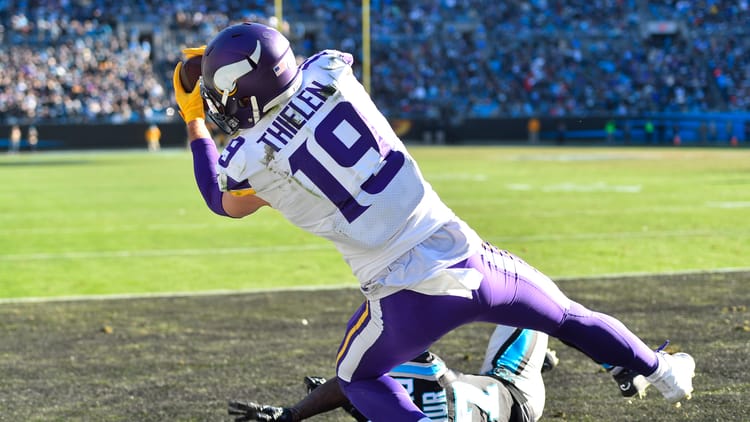 Vikings WR Adam Thielen fails to make a catch in the end zone as Kevon Seymour defends.