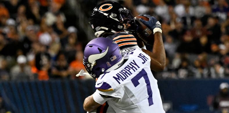 Rome Odunze makes a catch against the Vikings during the first half at Soldier Field.