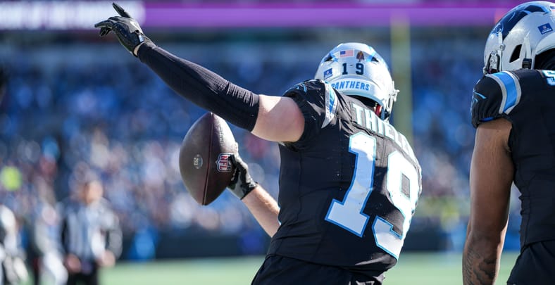 Adam Thielen celebrates a touchdown against the Cardinals in Charlotte.