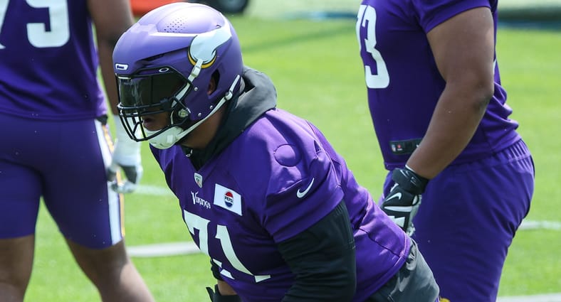 Christian Darrisaw practices at Vikings minicamp on June 10, 2025..