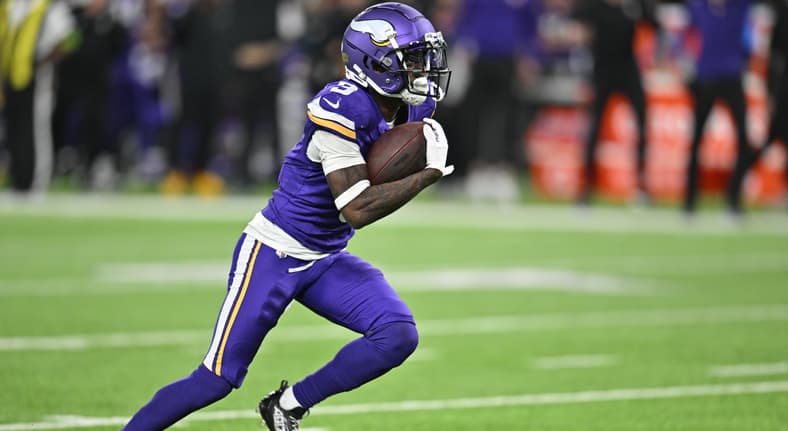 Jordan Addison celebrates after scoring a touchdown against the San Francisco 49ers at U.S. Bank Stadium.