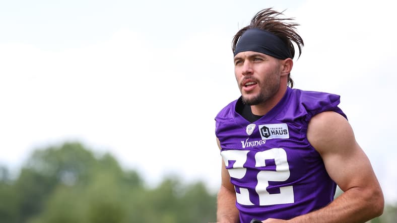 Harrison Smith runs onto the field during Vikings training camp at TCO Performance Center.