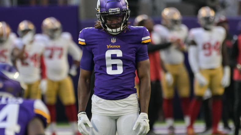 Lewis Cine warms up before a preseason game against the San Francisco 49ers.