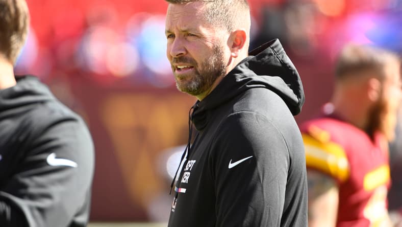Former Vikings Coach Lands