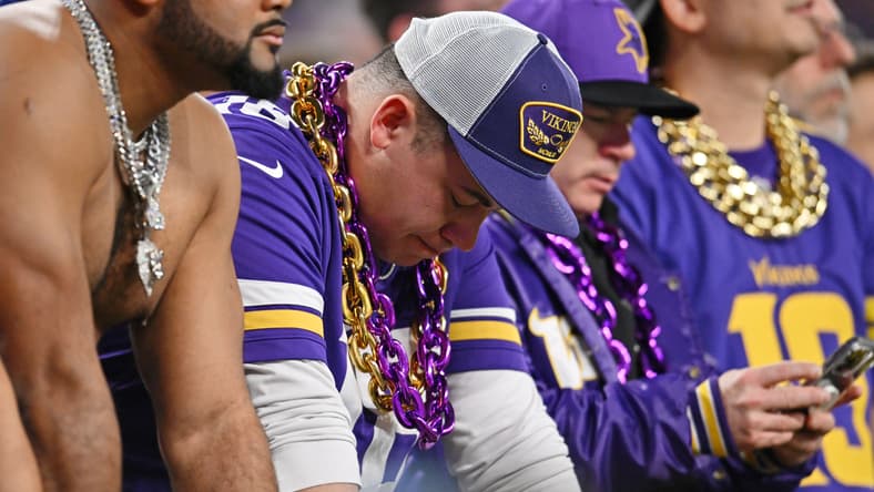 Vikings fans react during the fourth quarter of a 2023 playoff game vs. the Giants.