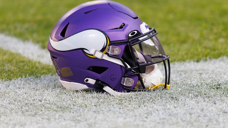 Minnesota Vikings helmet on the field at Lambeau before a game against the Green Bay Packers.